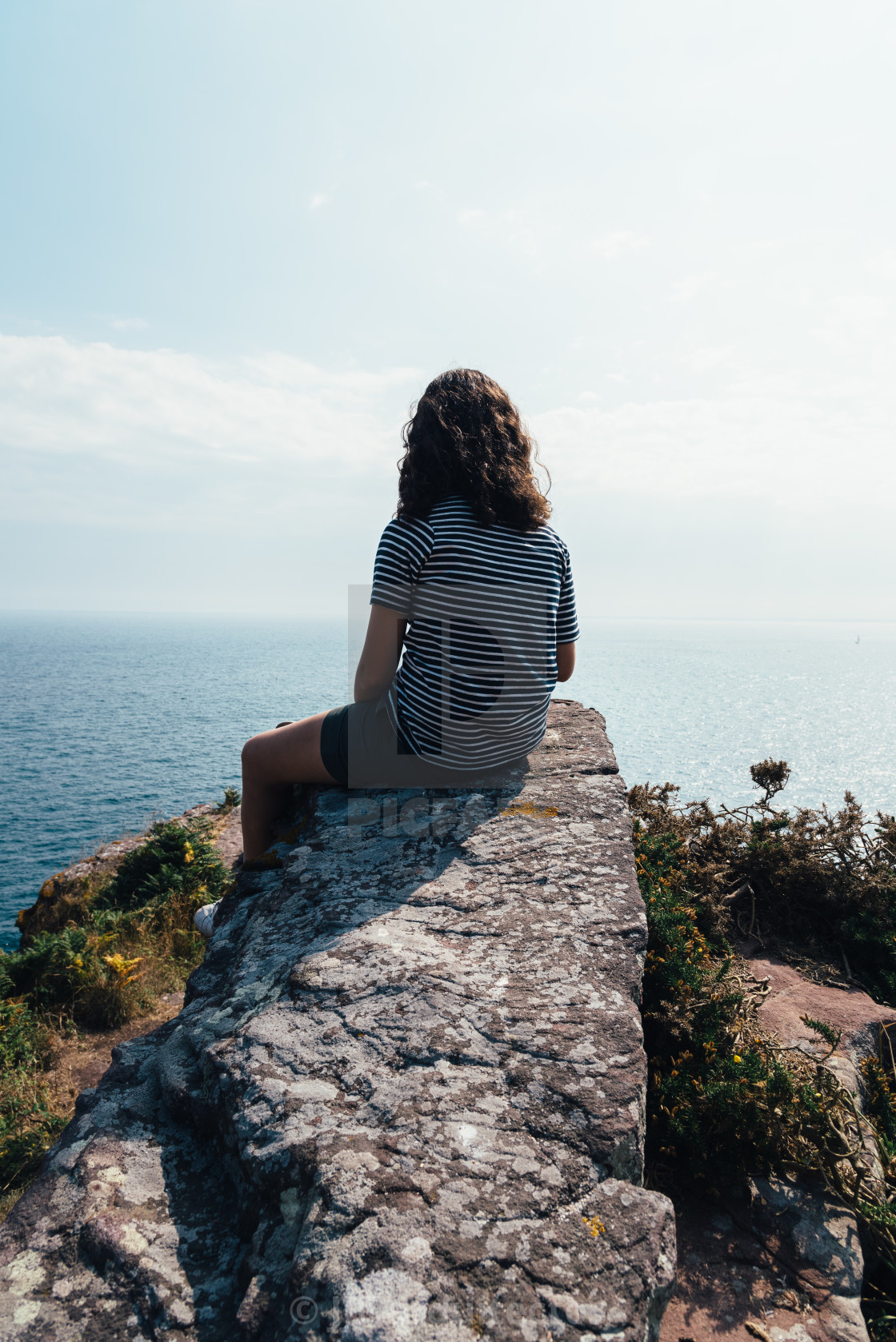 "Beautiful woman looking at seascape in Brittany" stock image