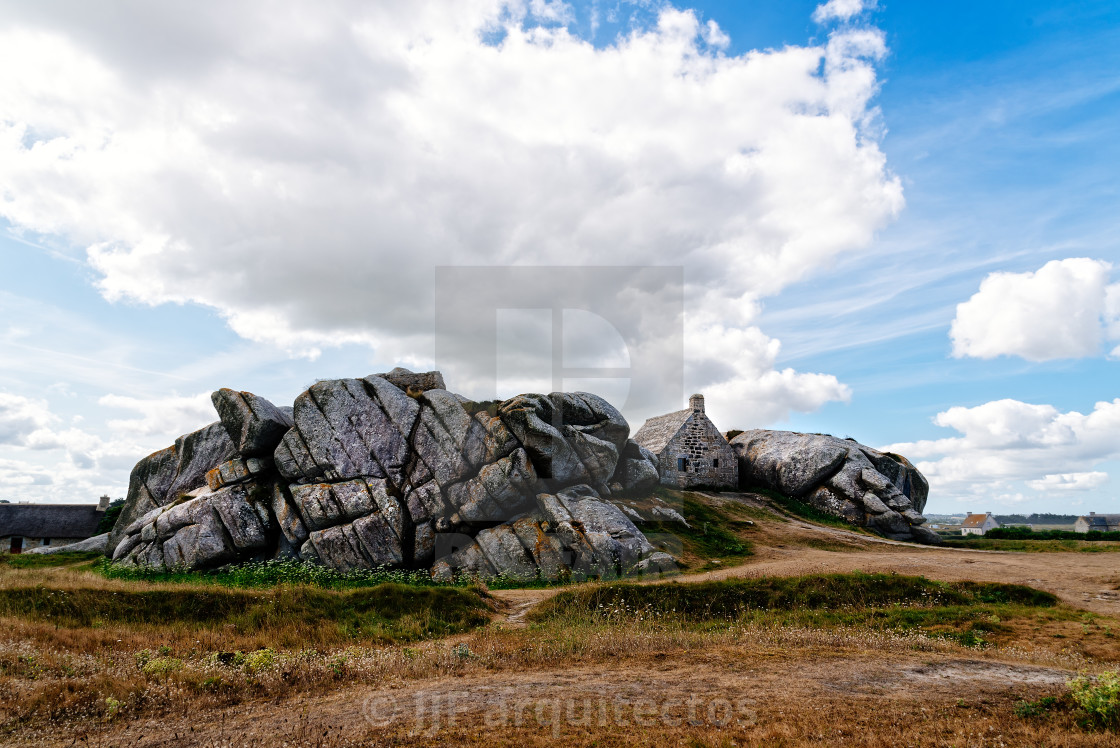 "House in the rocks in Meneham village" stock image