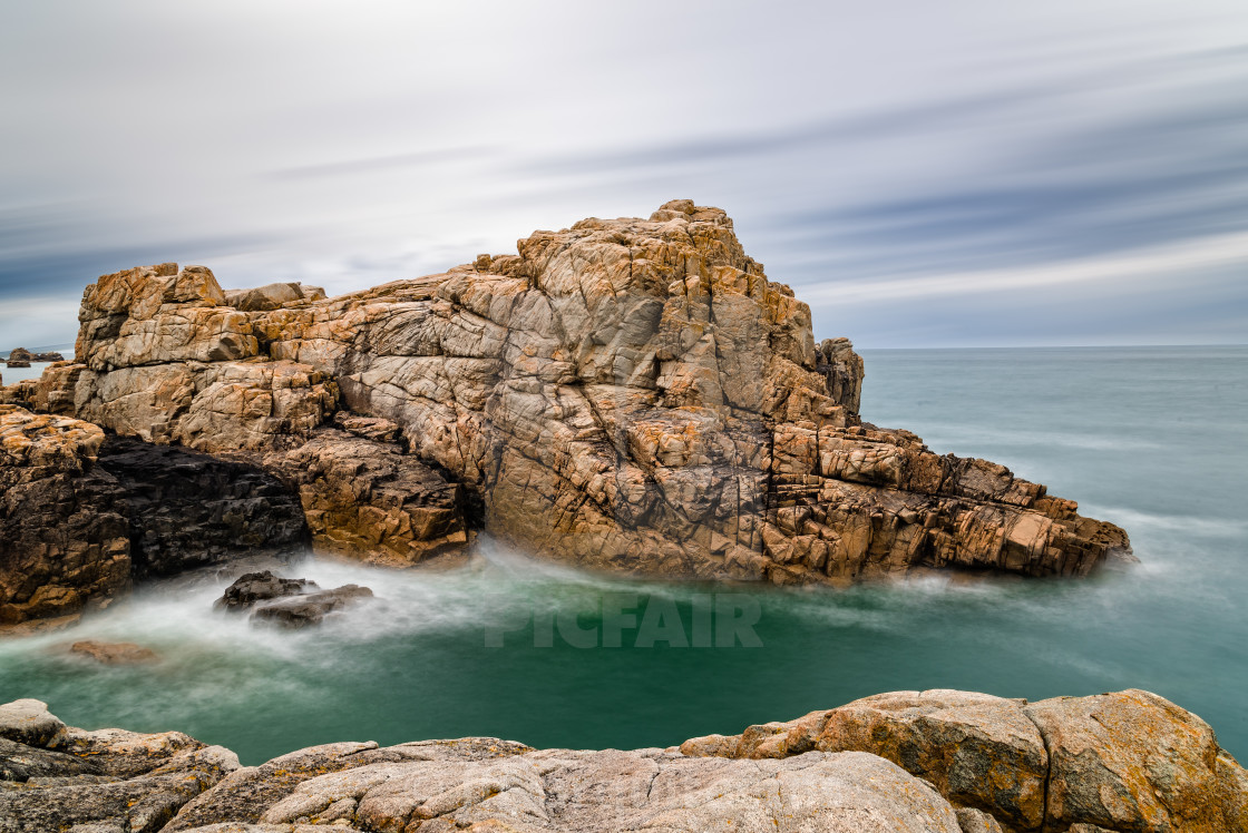 "Rock formation against sky in the coast" stock image