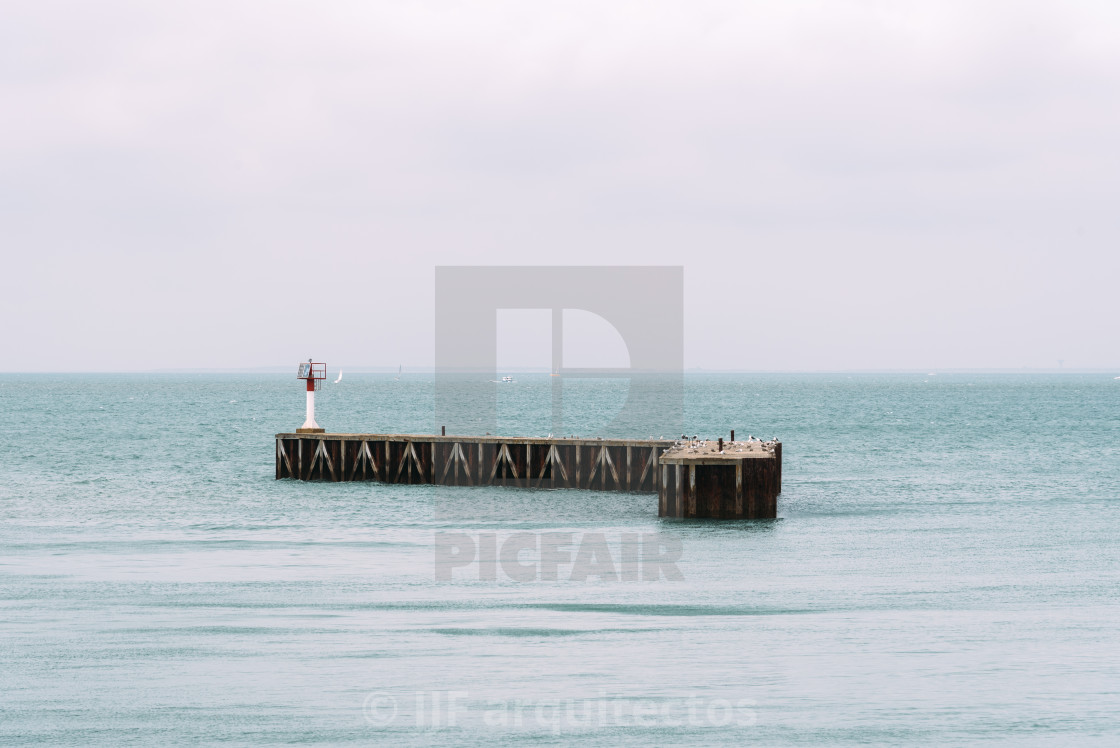 "Pier in the entrance to the port" stock image