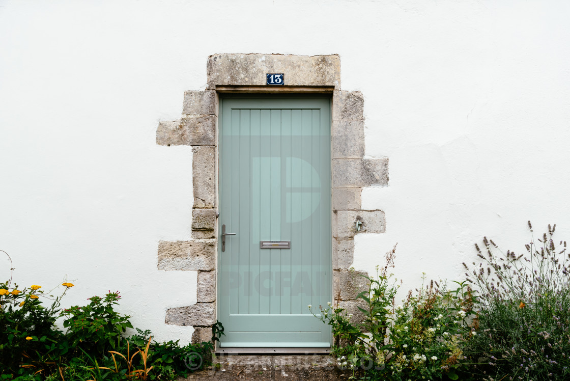 "Old wooden closed door with number 13" stock image