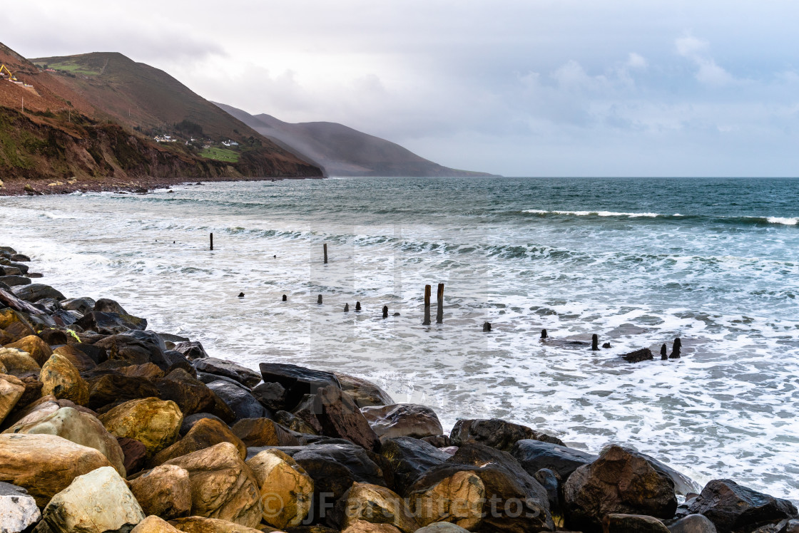 "Scenic view of rocky beach in the coast of Ireland" stock image