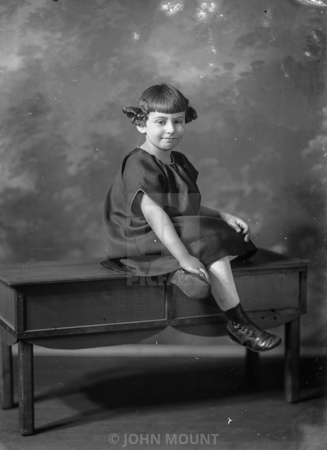 "VINTAGE PORTRAIT OF CHILD WITH UNUSUAL HAIRSTYLE" by JOHN MOUNT - £20.00 "VINTAGE PORTRAIT OF CHILD WITH UNUSUAL HAIRSTYLE" stock image