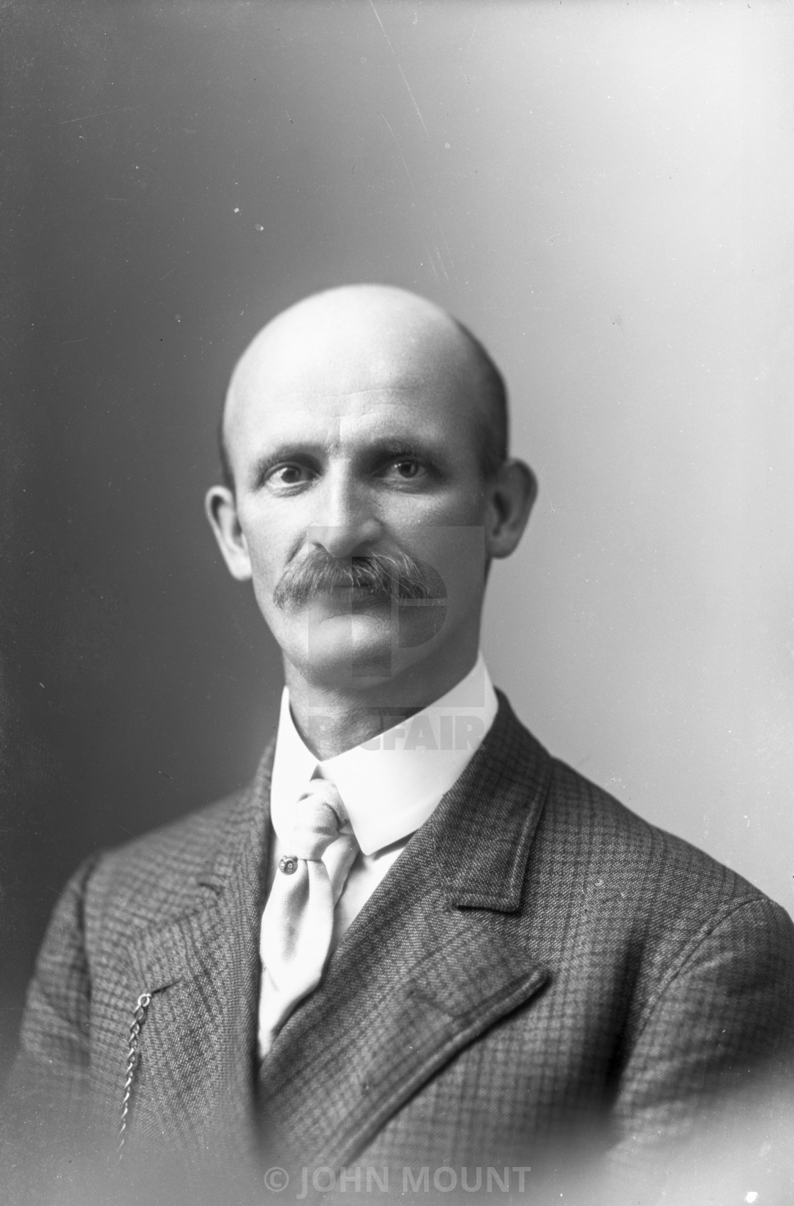 "VINTAGE STUDIO PORTRAIT OF BALD MAN" by JOHN MOUNT - £20.00 "VINTAGE STUDIO PORTRAIT OF BALD MAN" stock image