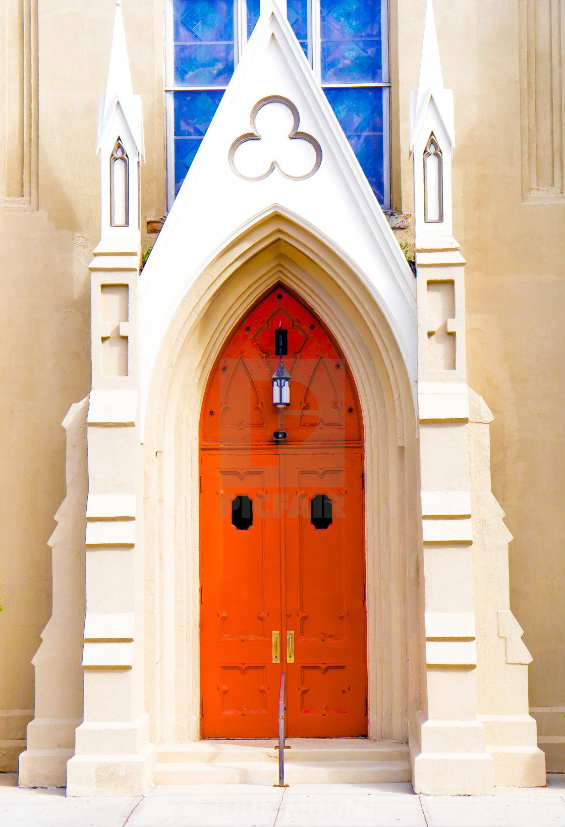 "RED CHURCH DOOR WITH BLUE GLASS WINDOWS" by JOHN MOUNT - $25.10 "RED CHURCH DOOR WITH BLUE GLASS WINDOWS" stock image