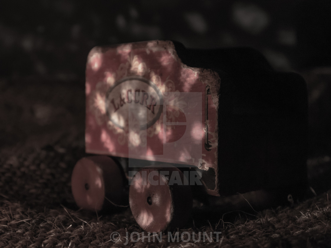 "STILL LIFE / STUDIO PHOTO OF VINTAGE TOY TRAIN CAR" by JOHN MOUNT - £20.00 "STILL LIFE / STUDIO PHOTO OF VINTAGE TOY TRAIN CAR" stock image
