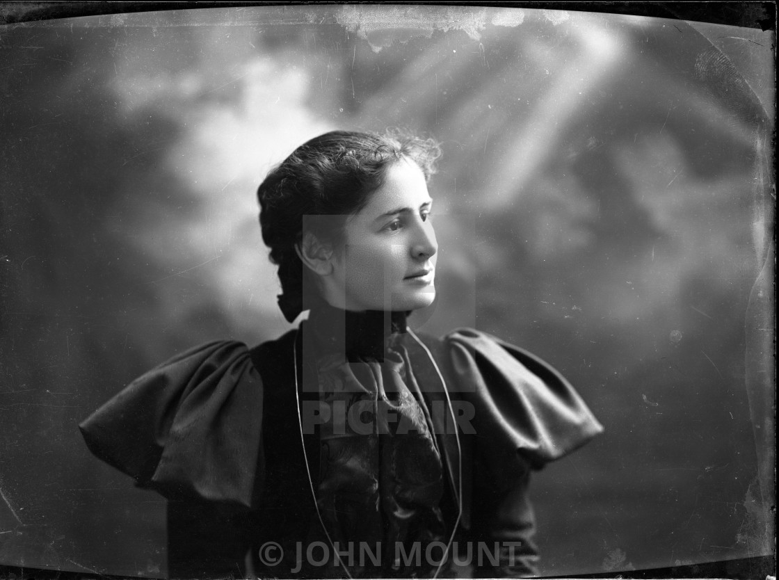 "STUDIO PORTRAIT OF BEAUTIFUL WOMAN IN ELEGANT DRESS" by JOHN MOUNT - £20.00 "STUDIO PORTRAIT OF BEAUTIFUL WOMAN IN ELEGANT DRESS" stock image