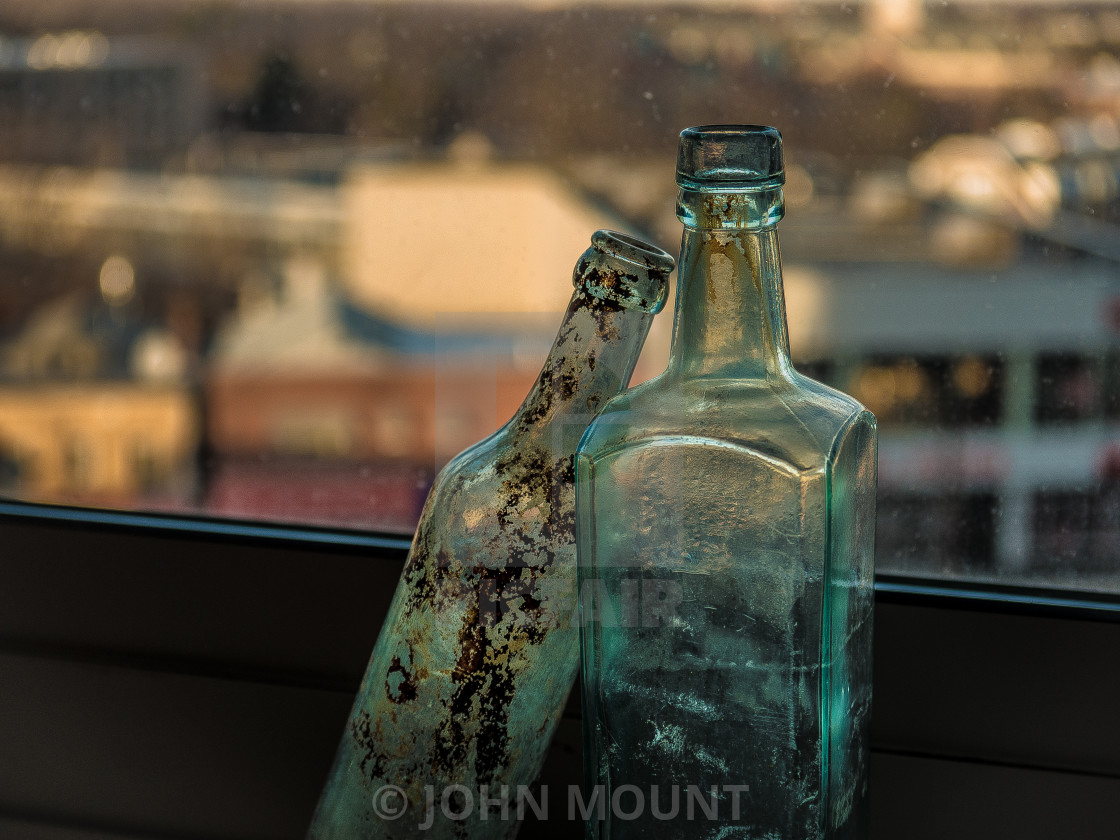 "OLD BOTTLES IN LOVE VERSION 2" by JOHN MOUNT - £20.00 "OLD BOTTLES IN LOVE VERSION 2" stock image