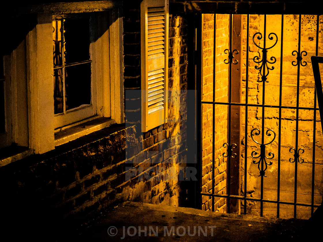 "WROUGHT IRON GATE , WINDOW AND STAIRWELL" by JOHN MOUNT - £20.00 "WROUGHT IRON GATE , WINDOW AND STAIRWELL" stock image