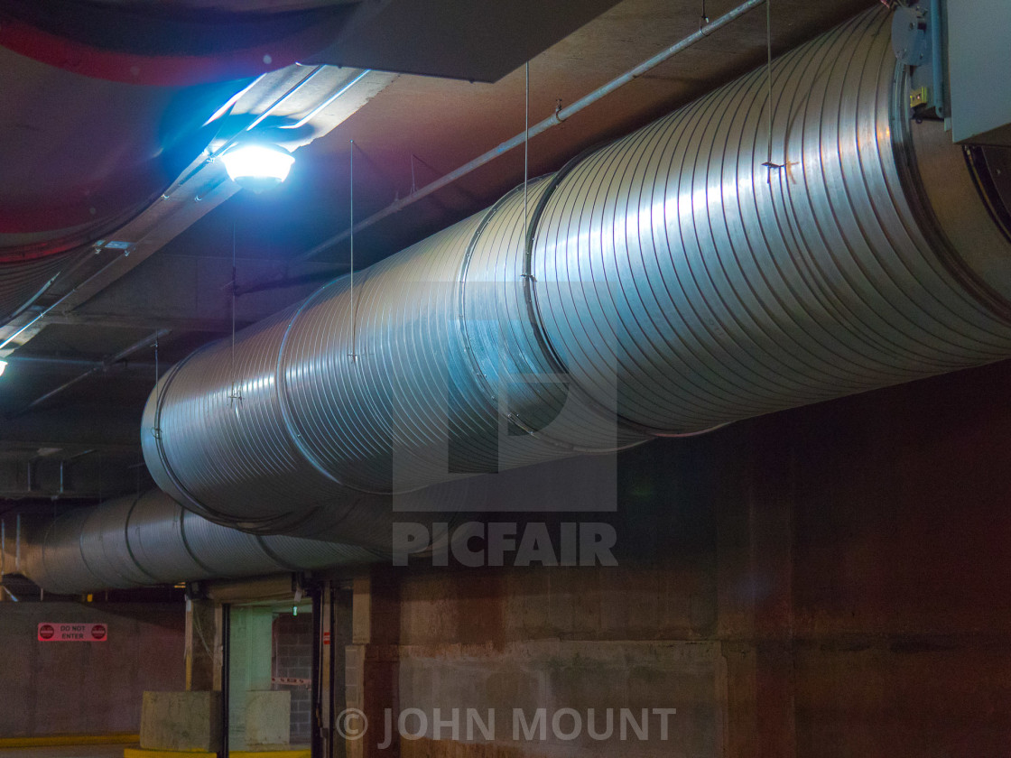 "INDUSTRIAL SIZE PIPE / AIR DUCT" by JOHN MOUNT - £20.00 "INDUSTRIAL SIZE PIPE / AIR DUCT" stock image