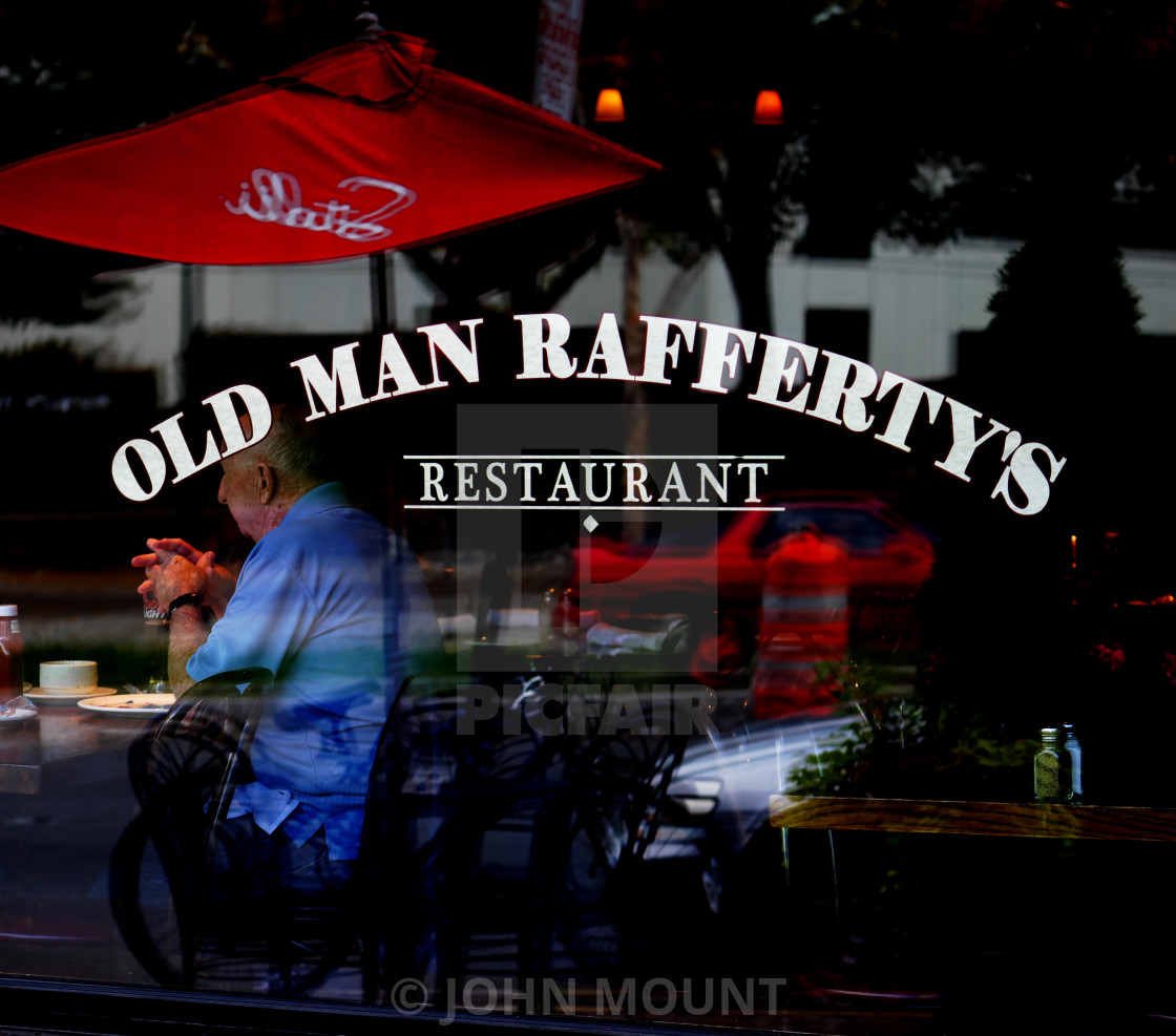 "Old Man at Old Man Rafferty's" by JOHN MOUNT - $25.10 "Old Man at Old Man Rafferty's" stock image