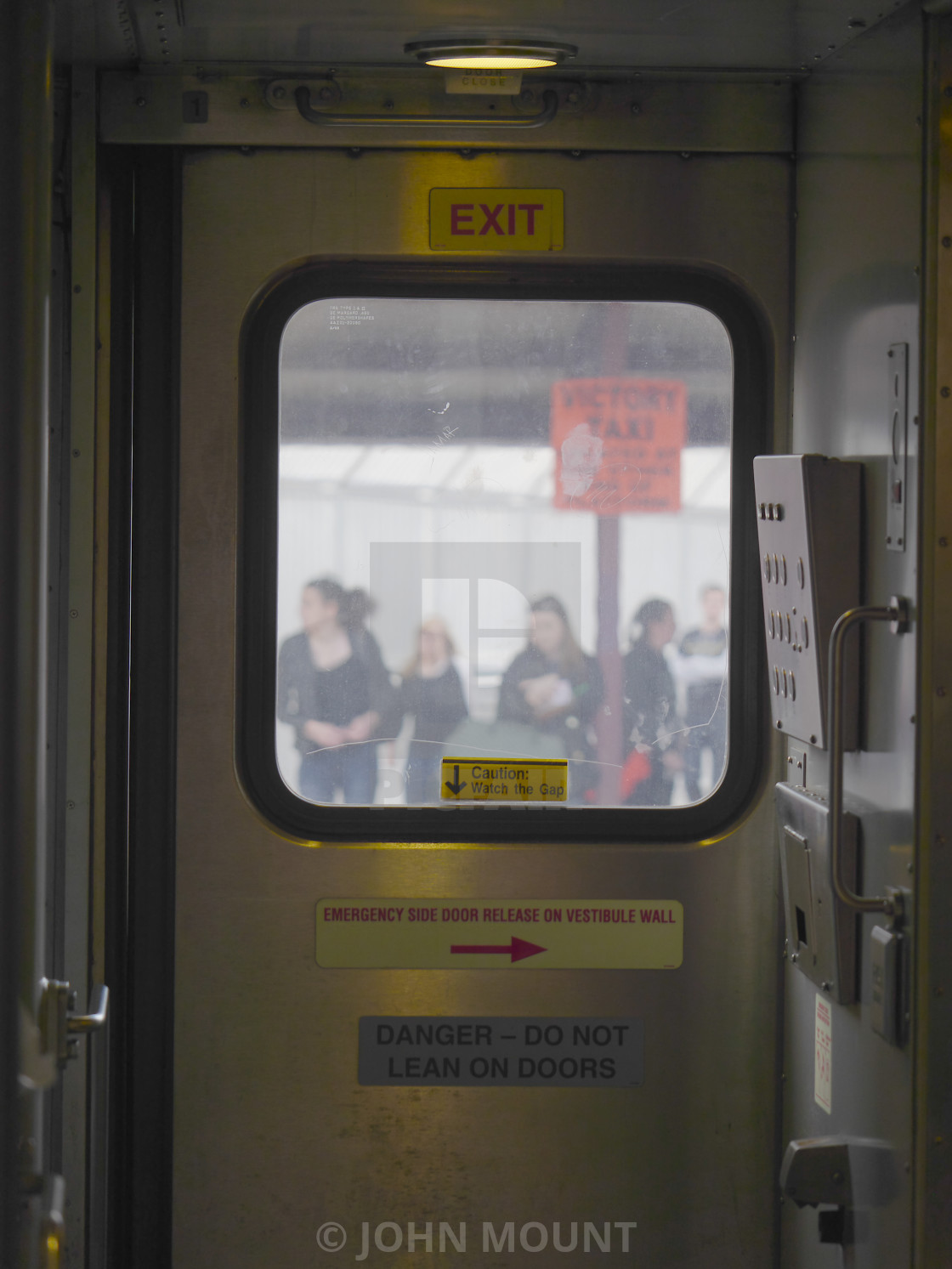 "Train Station Platform through the train window" by JOHN MOUNT - $25.10 "Train Station Platform through the train window" stock image