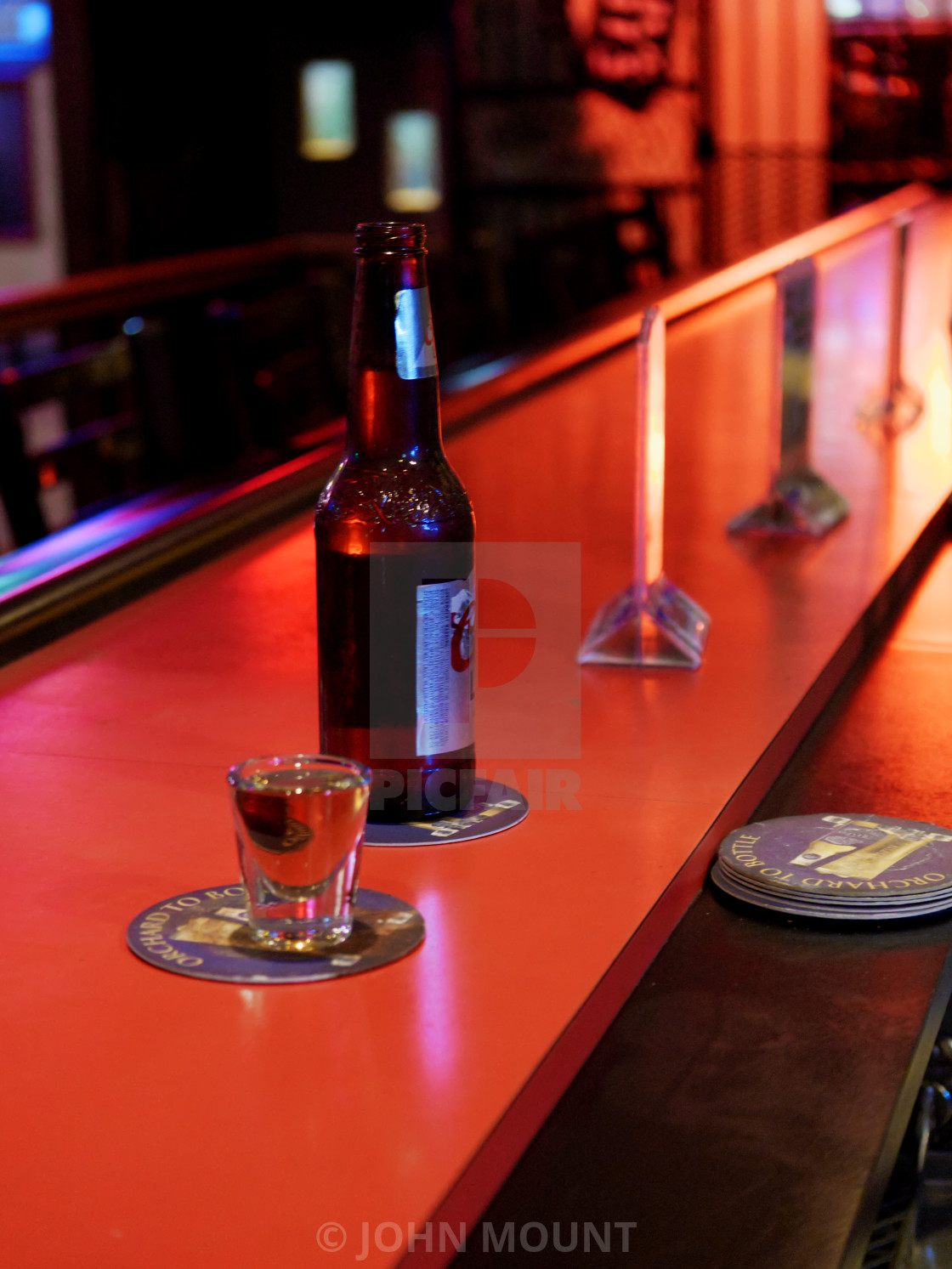"The orange bar" by JOHN MOUNT - $25.10 "The orange bar" stock image