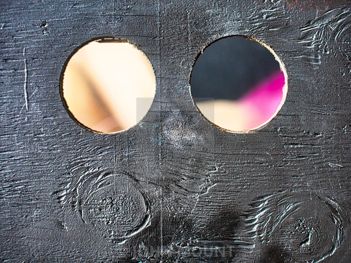 "Construction wall view holes" by JOHN MOUNT - £20.00 "Construction wall view holes" stock image