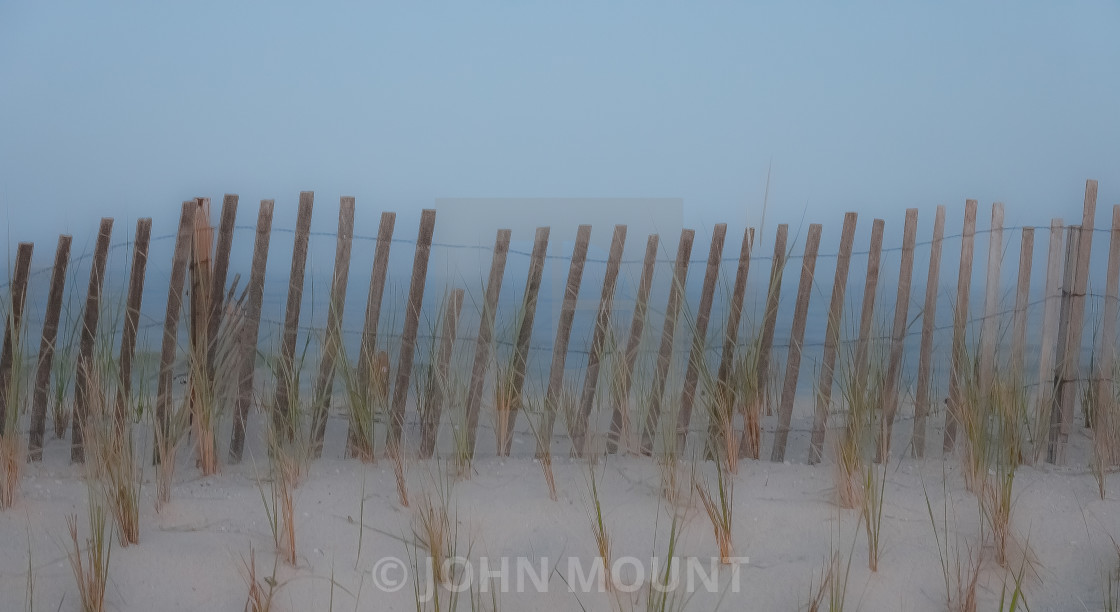 "Beach Fence on the sand dunes" stock image