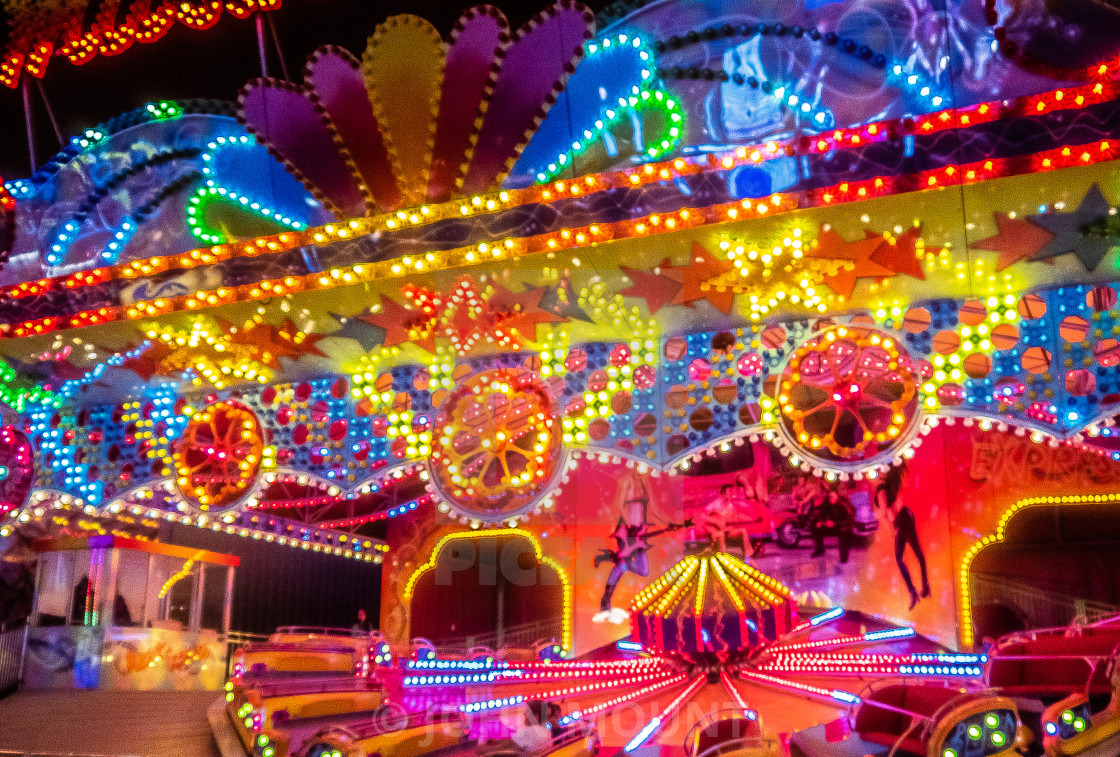 "Colorful Rides on the Seaside Heights Boardwalk" by JOHN MOUNT - £20.00 "Colorful Rides on the Seaside Heights Boardwalk" stock image