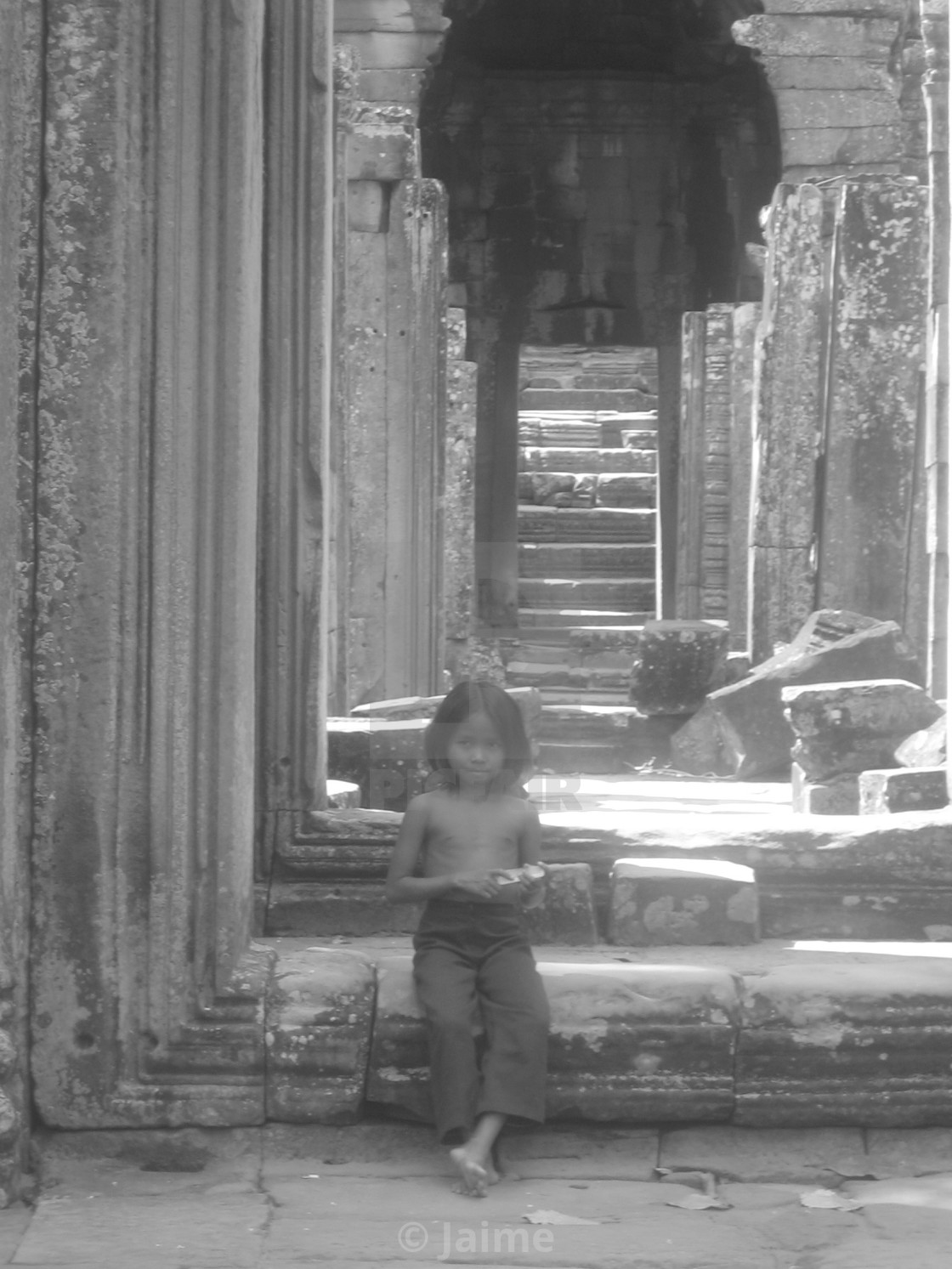 "Waiting in Angkor Wat" by Jaime - $7.66 "Waiting in Angkor Wat" stock image