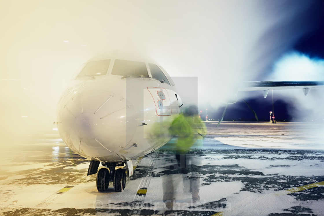 "Deicing of the airplane" stock image