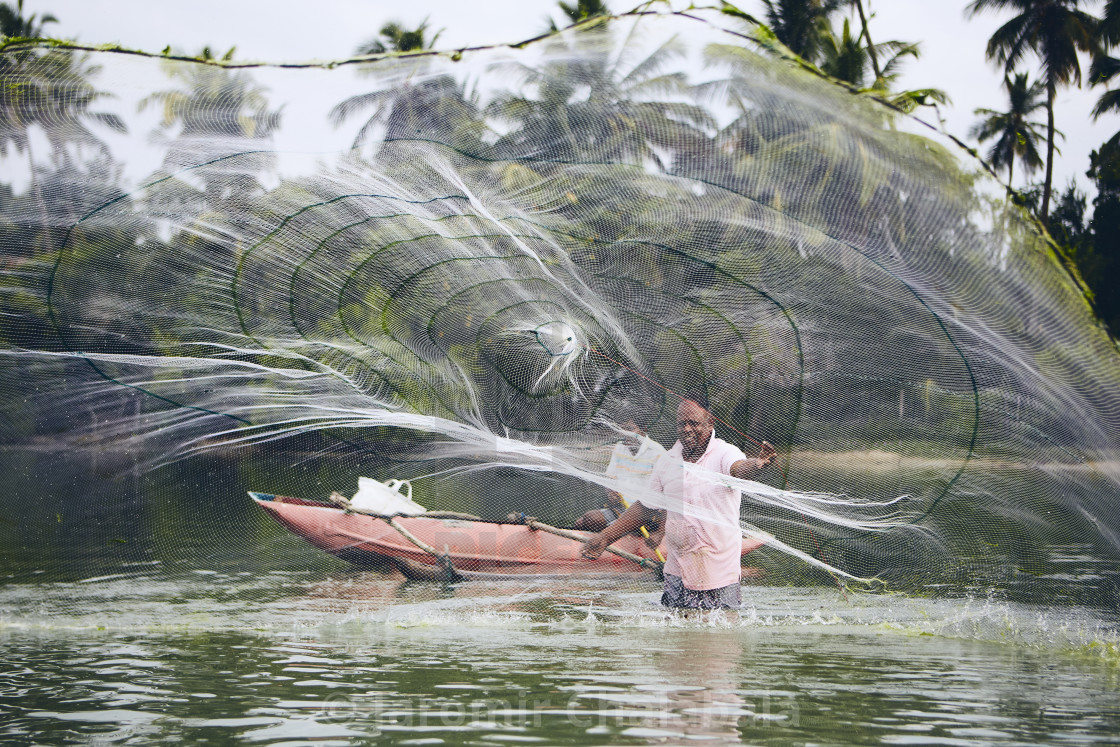 "Fishermen with fishing net" stock image