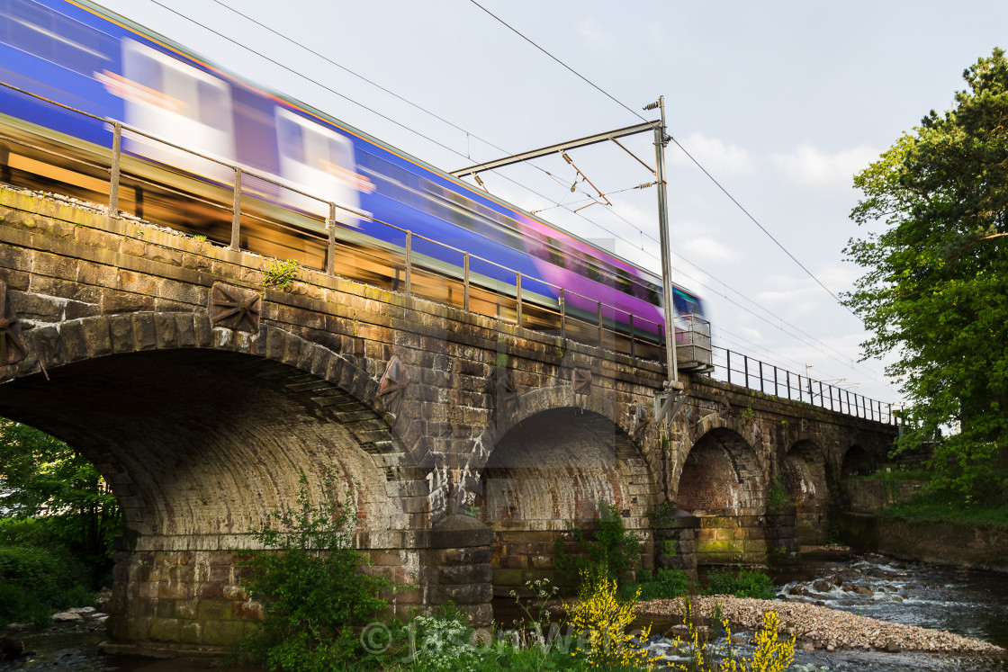 "Transpennine Express train over the arches" stock image