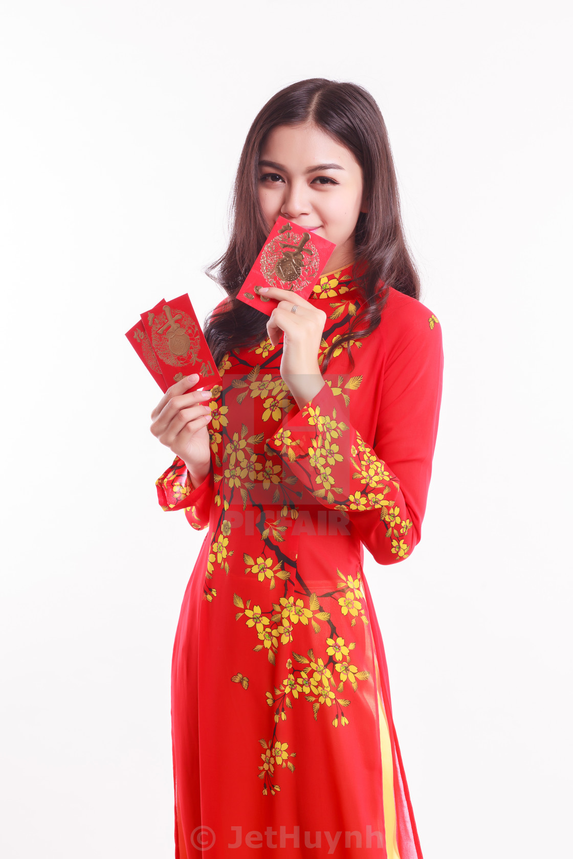 Beautiful Vietnamese Woman With Ao Dai Holding Lucky Red Packet For Celebrate Lunar New Year On White Background License Download Or Print For 9 92 Photos Picfair