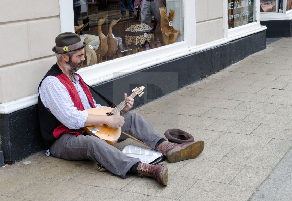 "The Busker" stock image