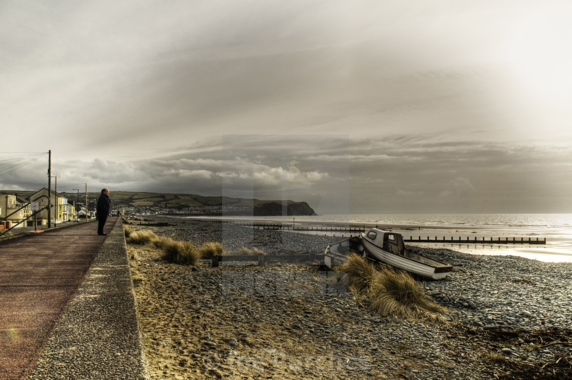 "Borth Beach Man and Boats" stock image