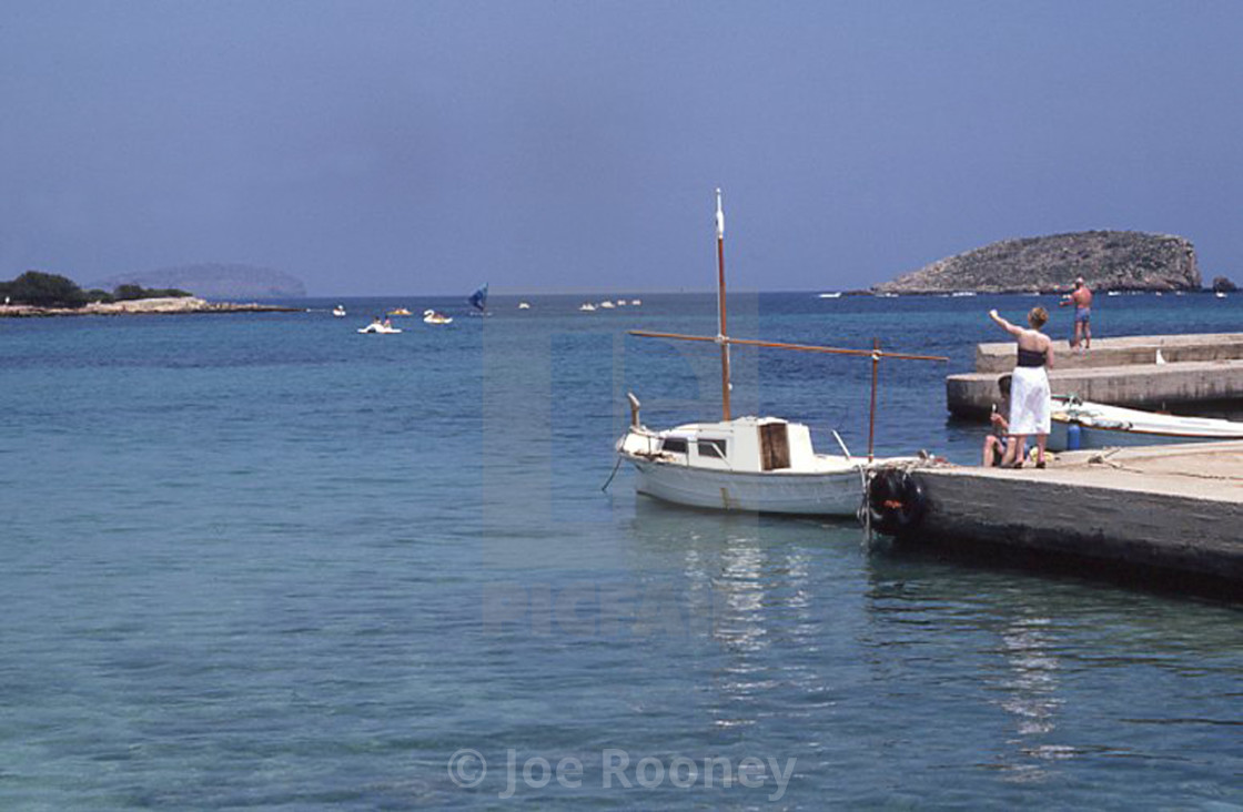 Holidaymakers With Small Boat At The Quayside Es Cana Ibiza