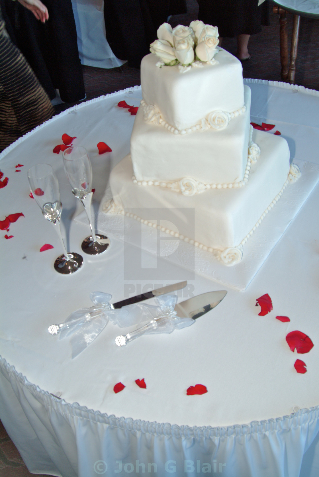 A White 3 Tier Square Wedding Cake With Icing Decorations Is Displayed On A License Download Or Print For 12 40 Photos Picfair