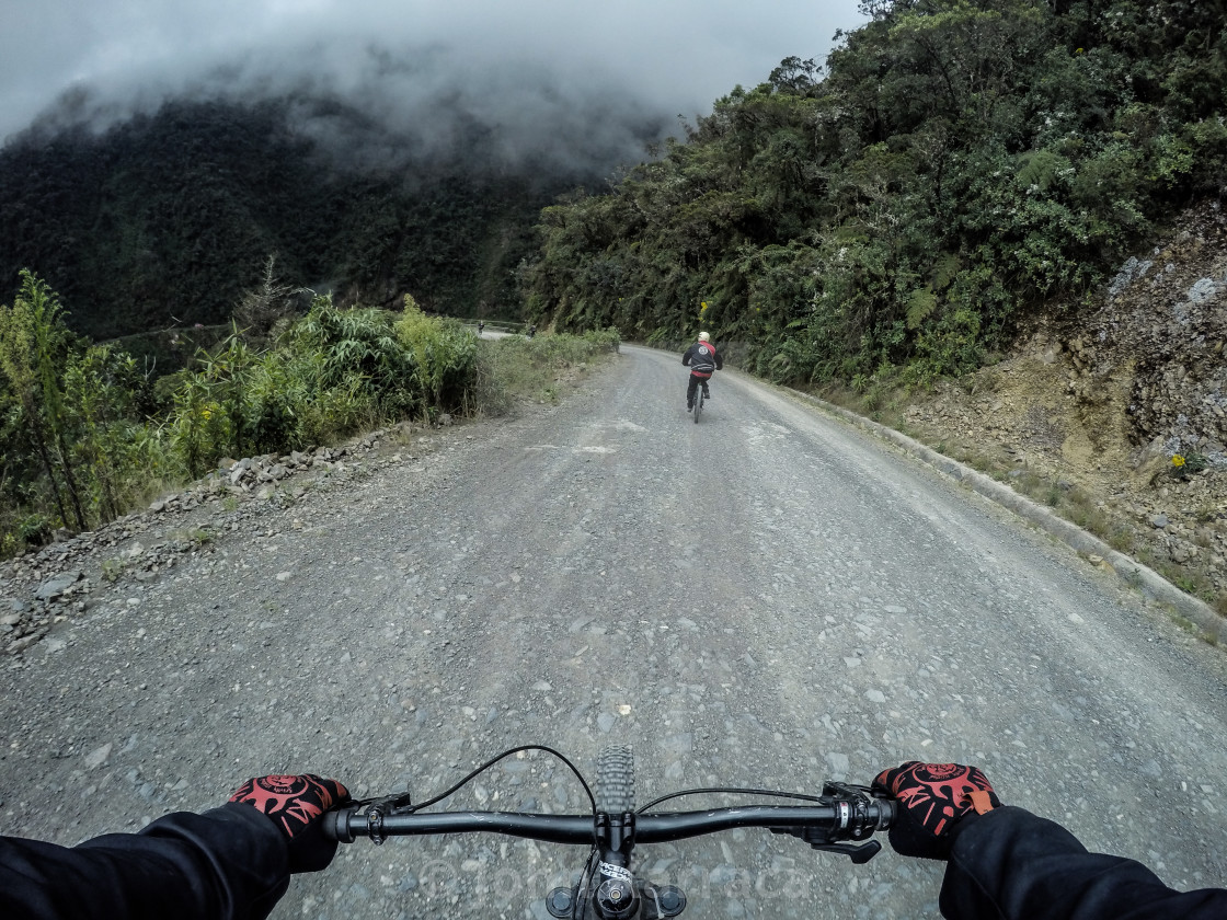 "montainbike along the most dangerous path in the world - road of death in Bolivia" by John Karraca - $10.60 "montainbike along the most dangerous path in the world - road of death in Bolivia" stock image