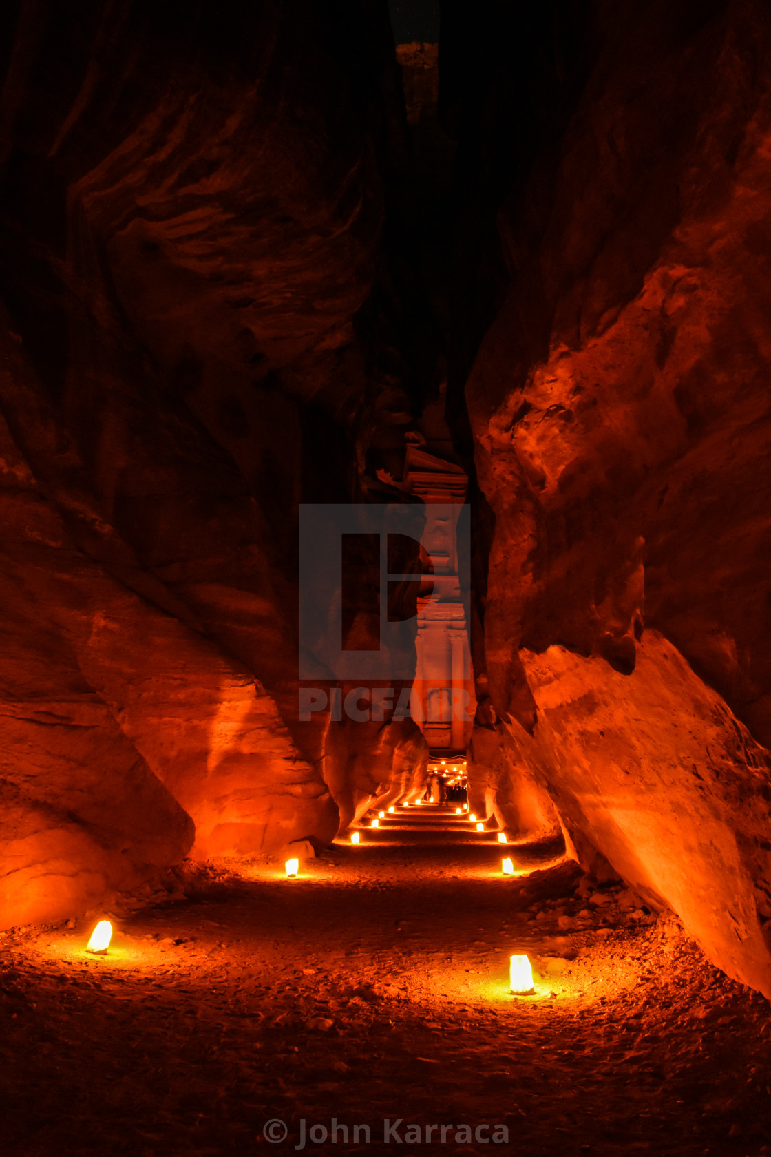 "night corridor illuminated with candles in Jordan - Petra by night" by John Karraca - $10.60 "night corridor illuminated with candles in Jordan - Petra by night" stock image