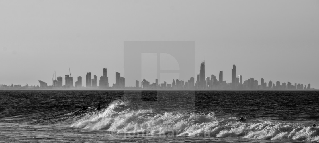 "surf and Sup in the background of Melbourne in Australia, with cold water and high waves" by John Karraca - $4.58 "surf and Sup in the background of Melbourne in Australia, with cold water and high waves" stock image