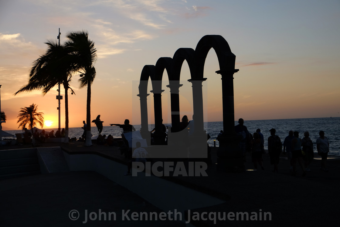 "SUNSET SCENE PUERTO VALLARTA 2" by John Kenneth Jacquemain - $18.07 "SUNSET SCENE PUERTO VALLARTA 2" stock image