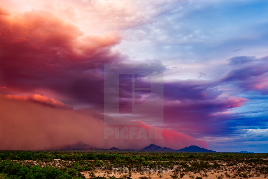 "Dust storm in the desert at sunset" stock image