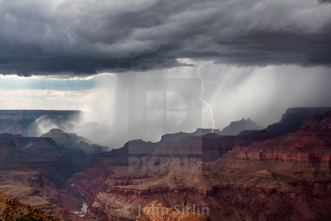 "Lightning strikes as a thunderstorm moves through the Grand Canyon" stock image