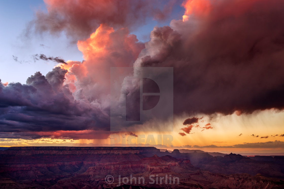 "Dramatic storm clouds over the Grand Canyon at sunset" stock image