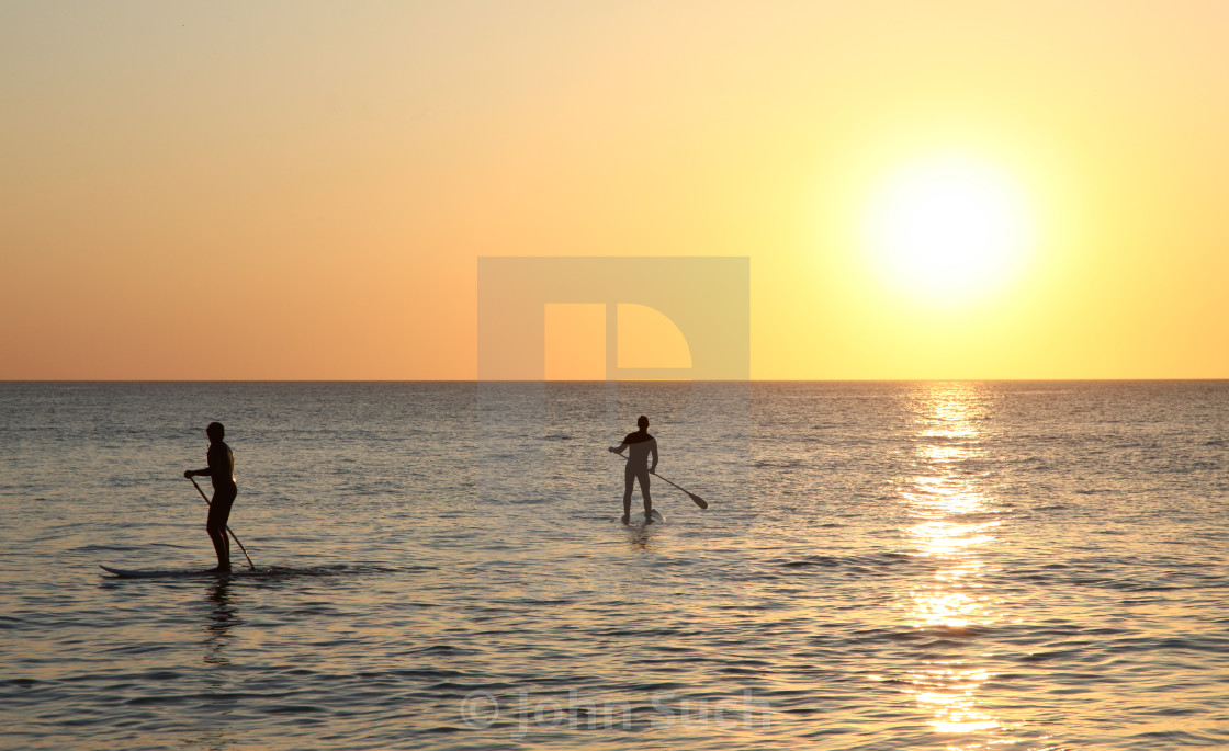 "Sunset Boarders" stock image