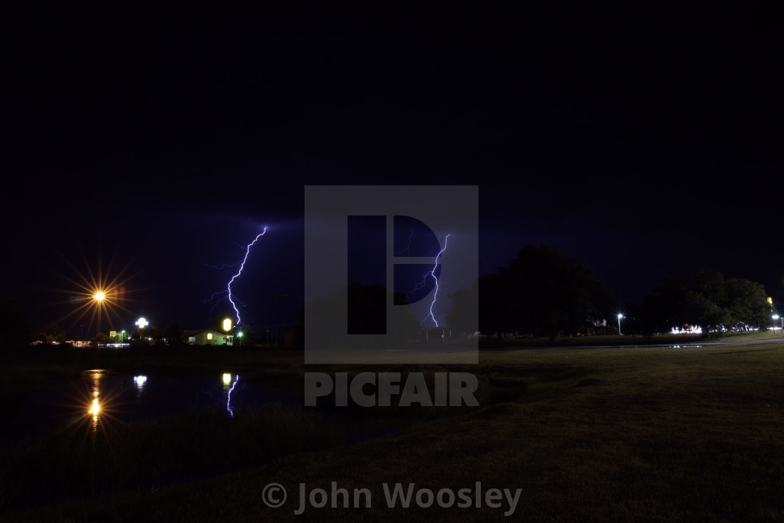 "Lightning with a reflection" by John Woosley - $6.07 "Lightning with a reflection" stock image