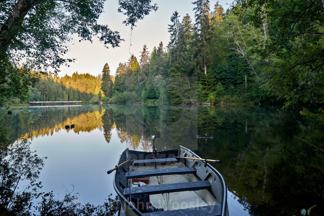 "Empty boat on lake" stock image