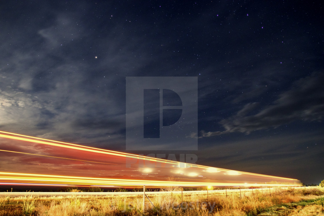 "Semi truck driving by" stock image