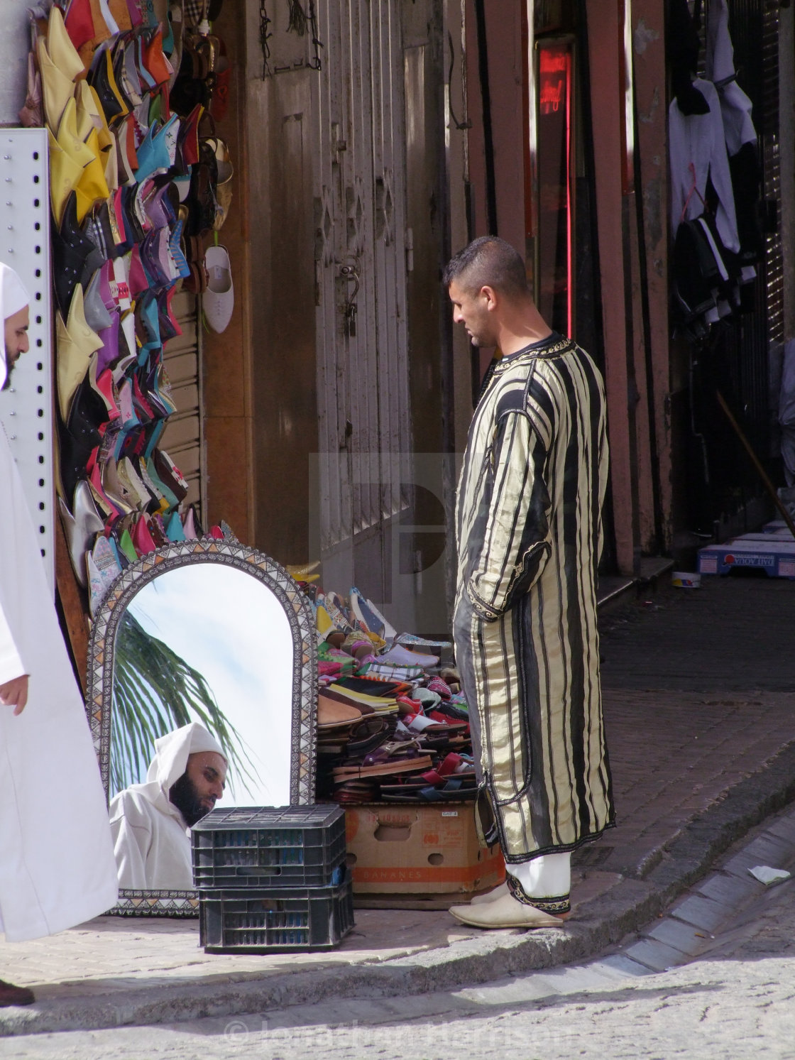 "Moroccan Man's Reflection, Grand Socco, Tangier" by Jonathan Harrison - $12.35 "Moroccan Man's Reflection, Grand Socco, Tangier" stock image