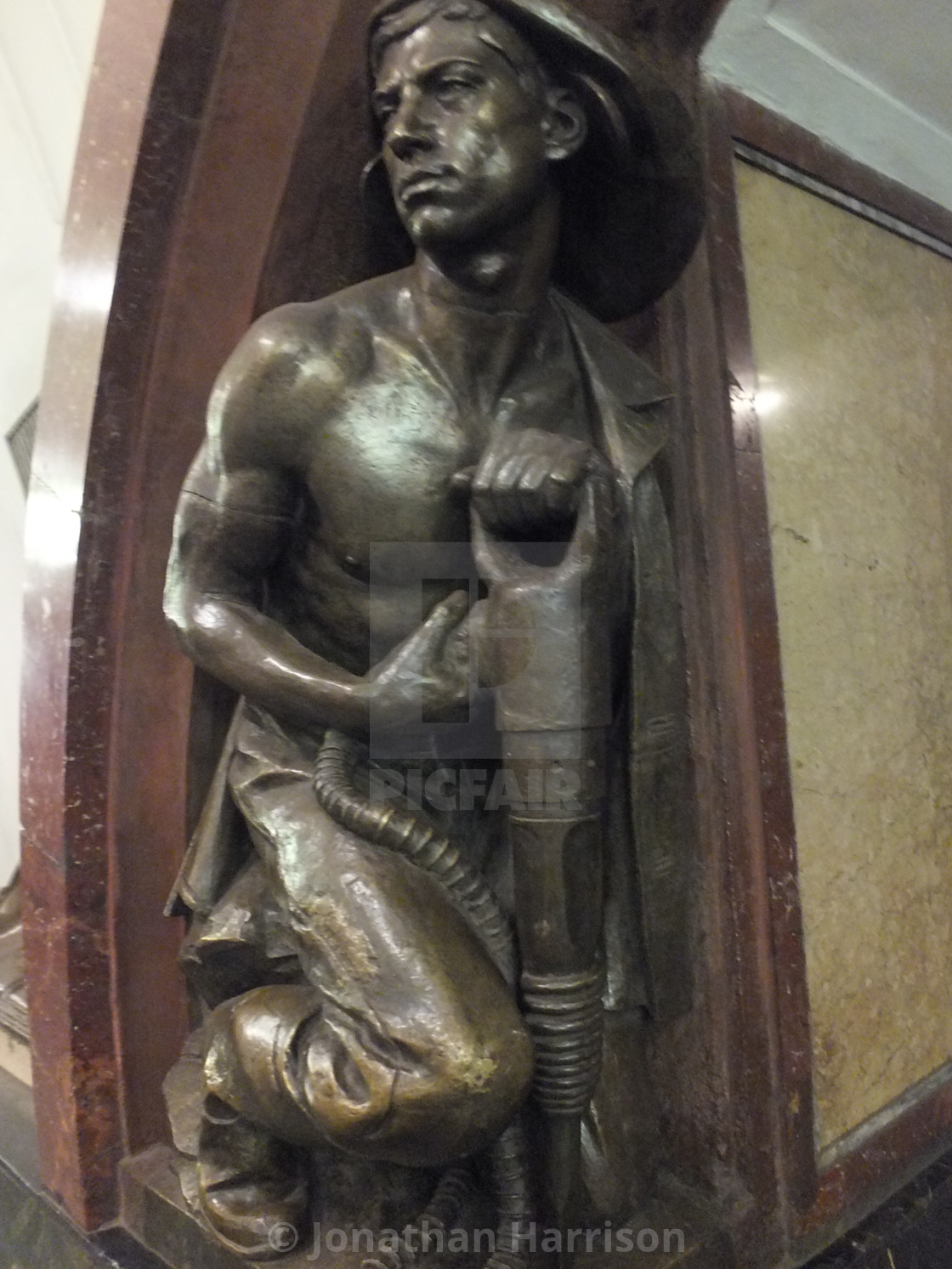 "Bronze Sculpture of a Miner, Metro" by Jonathan Harrison - $12.44 "Bronze Sculpture of a Miner, Metro" stock image