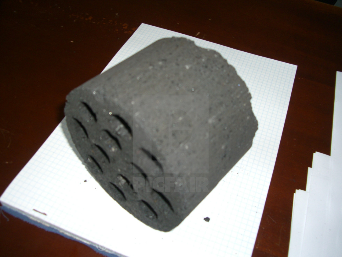 "10 Hole Coal Briquette, Trzebinia" by Jonathan Harrison - $12.44 "10 Hole Coal Briquette, Trzebinia" stock image