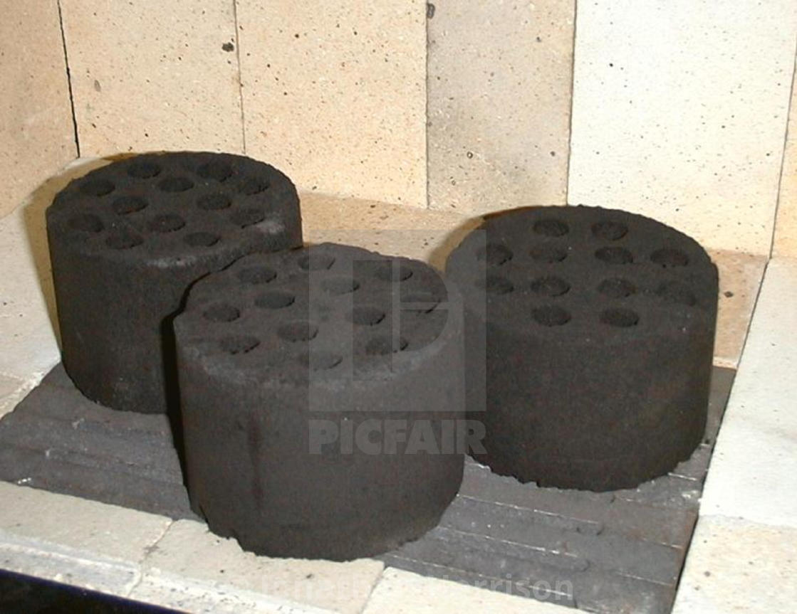 "10 Hole Coal Briquettes, Trzebinia" by Jonathan Harrison - $12.44 "10 Hole Coal Briquettes, Trzebinia" stock image