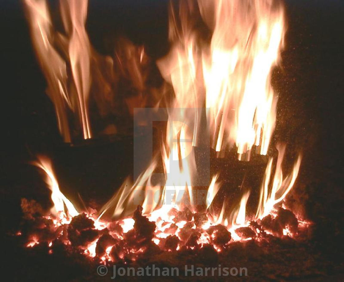 "Three 10 Hole Coal Briquettes Burning, Trzebinia" by Jonathan Harrison - $12.44 "Three 10 Hole Coal Briquettes Burning, Trzebinia" stock image