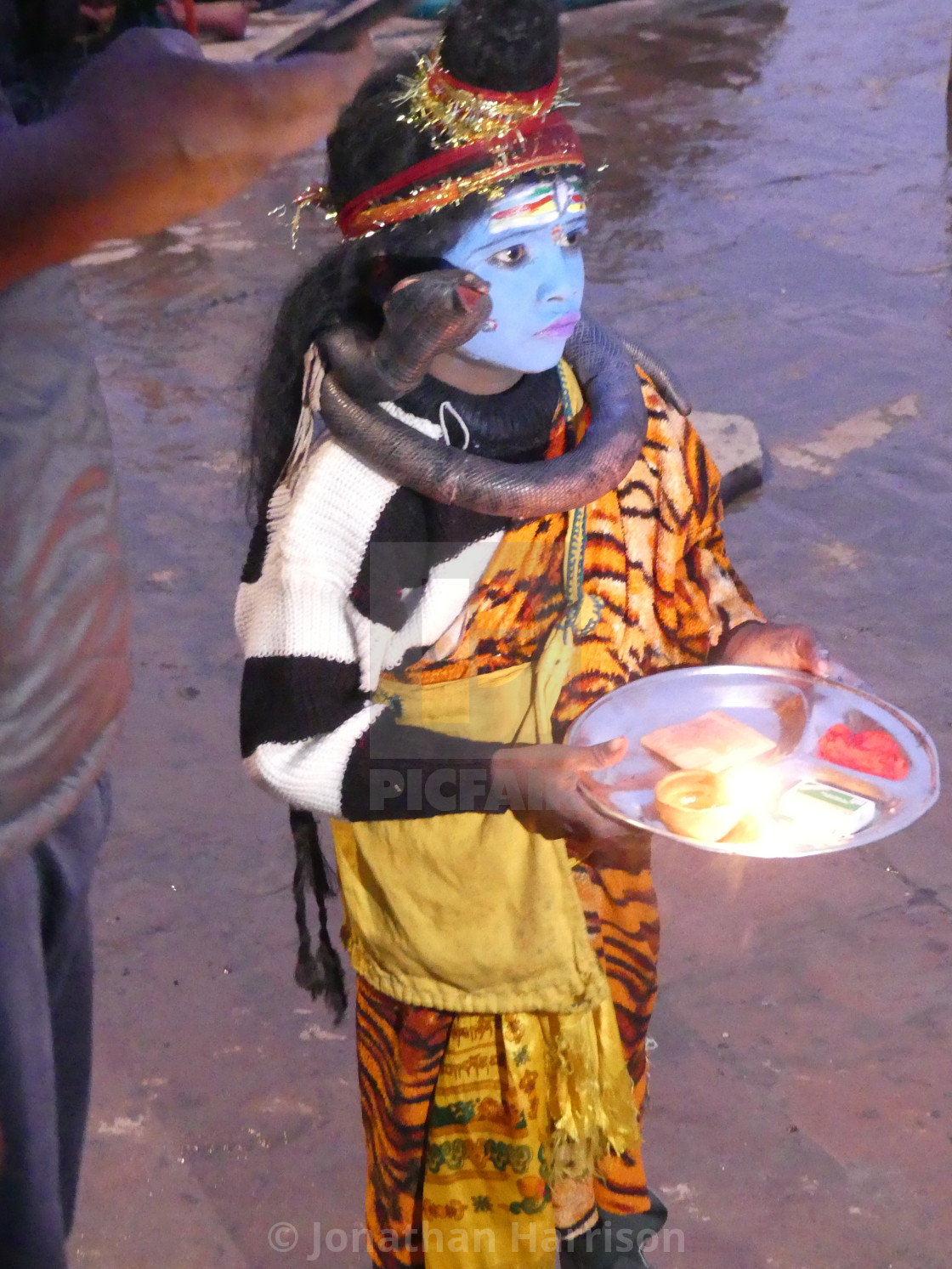 "Indian Child with Hindu Offerings" by Jonathan Harrison - $12.44 "Indian Child with Hindu Offerings" stock image