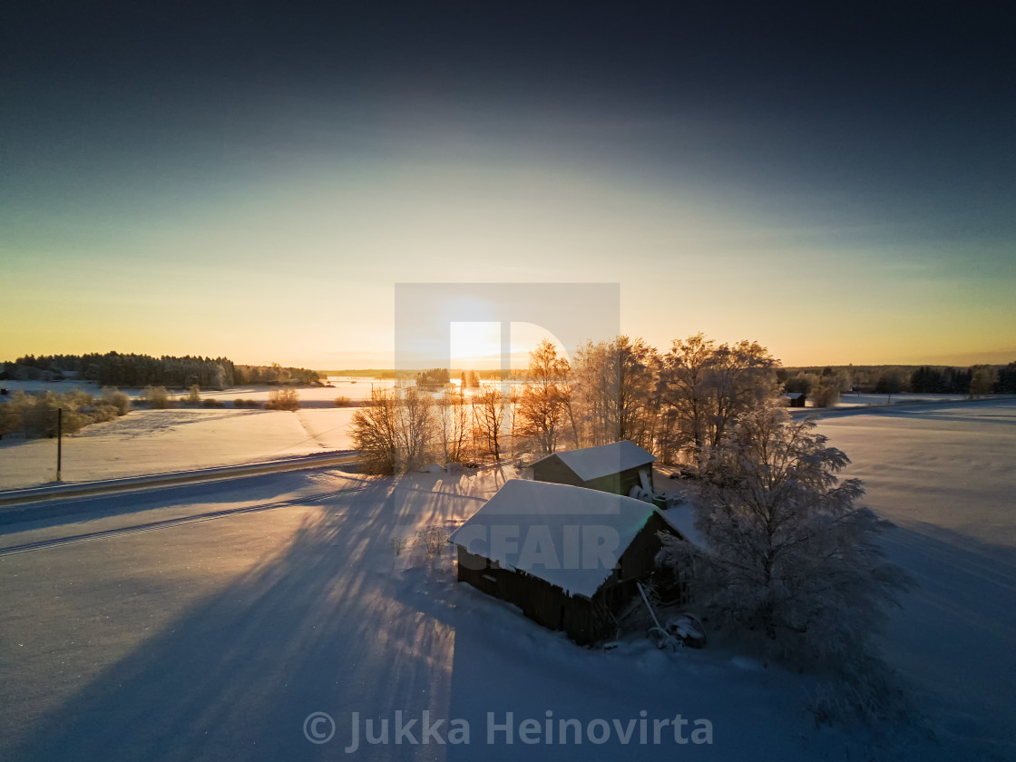 Farm Houses In The Winter Sunset License Download Or