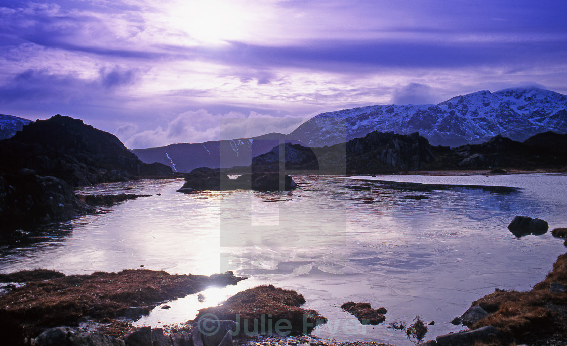 "Mountain tarn in winter" by Julie Fryer - £18.60 "Mountain tarn in winter" stock image
