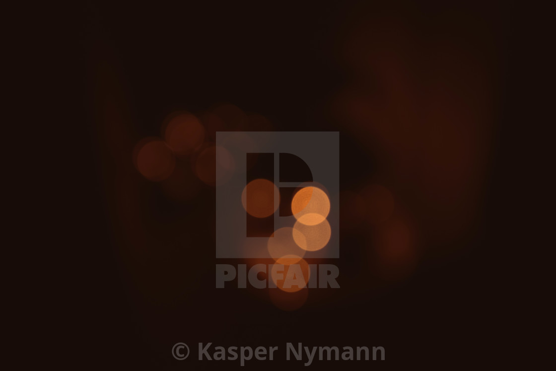 Bokeh Lights In Orange Golden Colors On Brown Background License