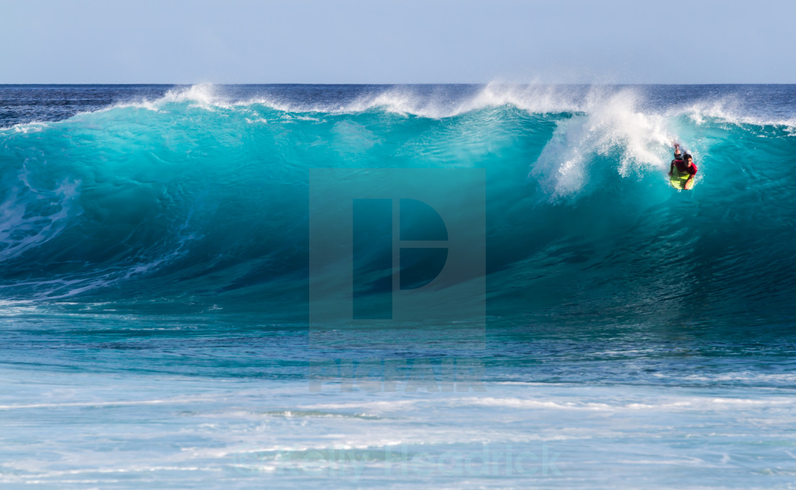 "Bodyboarding in Hawaii" stock image